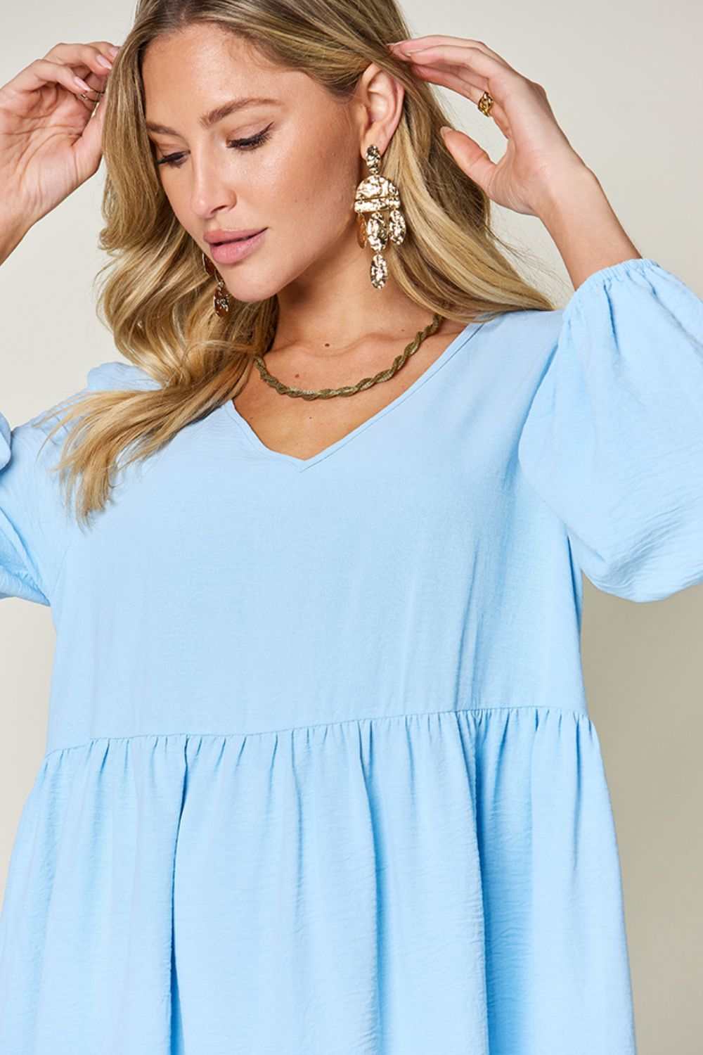 V-Neck Balloon Sleeve Tiered Dress with Pockets in light blue.