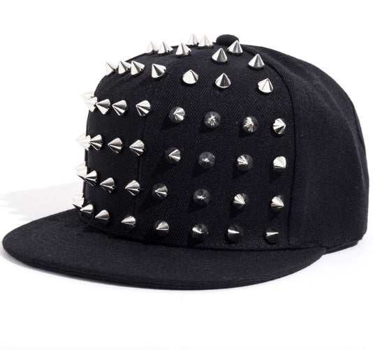 Black cotton hat with metal rivets, stylish and edgy design.