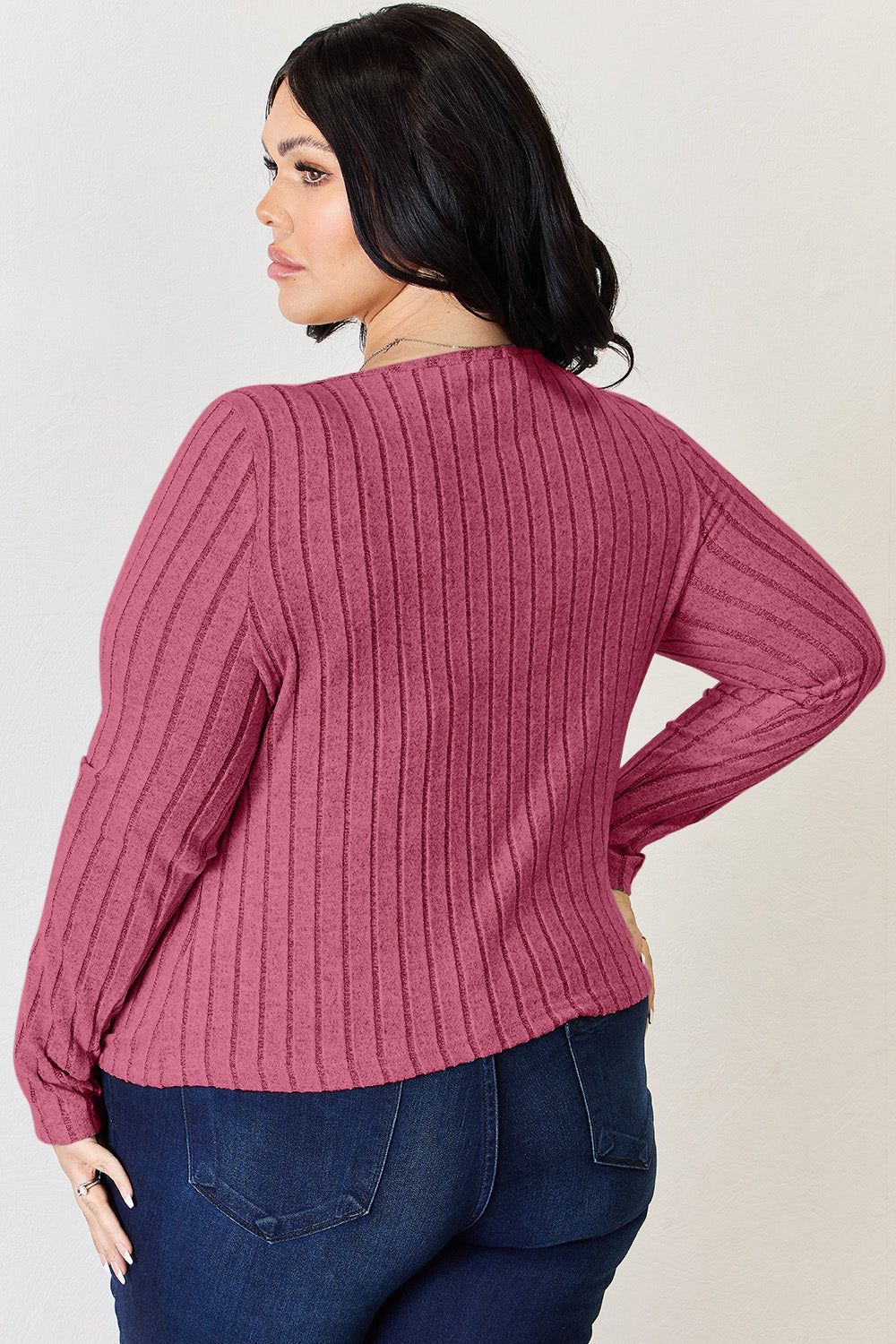 Ribbed long sleeve tee in pink, featuring a basic style with slight stretch.