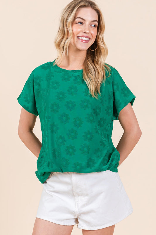 Floral Pattern Tee in textured fabric with short sleeves, styled for a casual look.