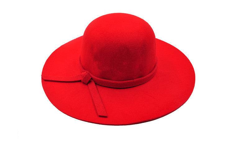 Casual women's red fedora hat with solid pattern.